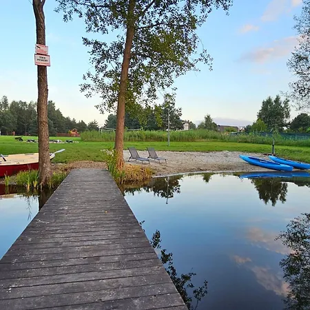 Dom wakacyjny Osada Pod Gwiazdami&spa - Deluxe Blisko Jezioro, Ogrodzony, Ognisko, Taras, Dodatkowa Sypialnia Lasko
